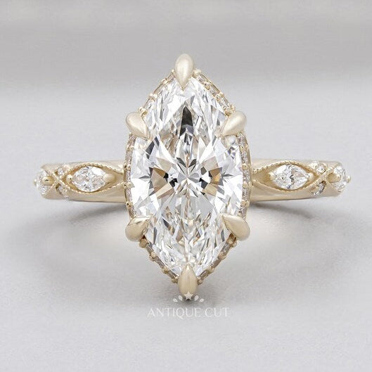 Marquise cut engagement ring yellow gold vintage band lab diamond