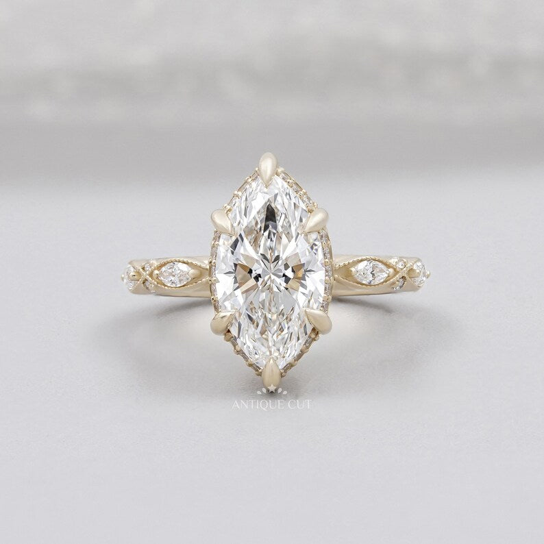Marquise cut engagement ring yellow gold vintage band lab diamond