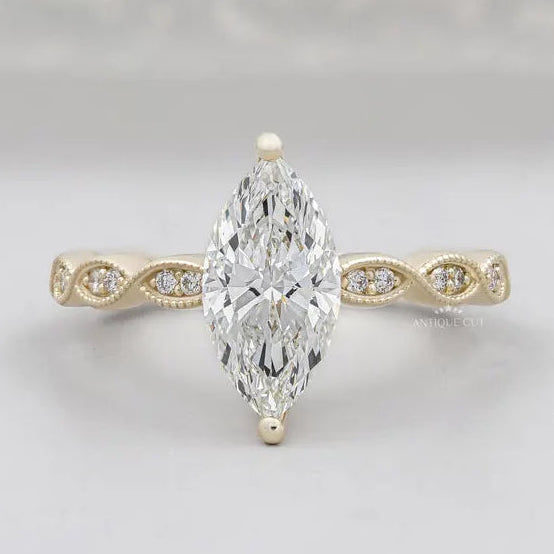 Marquise cut engagement ring in yellow gold