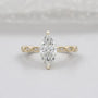 Marquise cut engagement ring in yellow gold