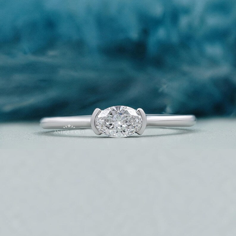 East west engagement ring oval solitaire diamond