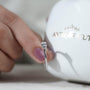 Sleek white gold east west engagement ring