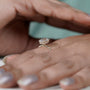 Modern oval engagement ring with hidden sparkle