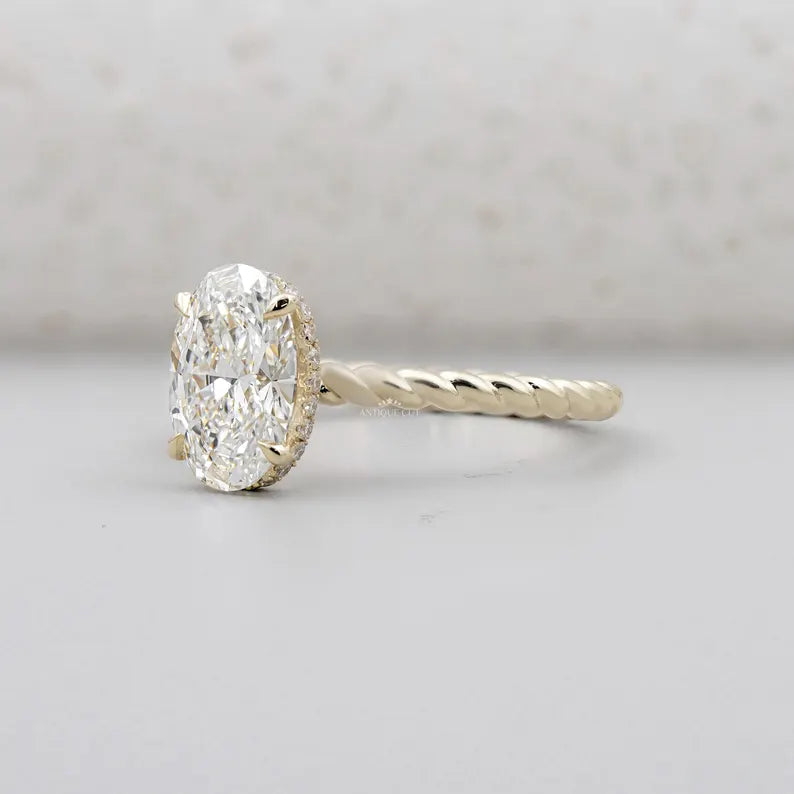 Lab grown oval engagement ring twisted band design