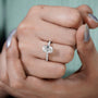 Oval diamond ring with brilliant fire and pave accents