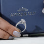 Timeless oval engagement ring with pave diamond detailing