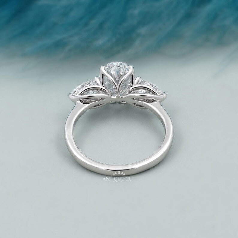 Lab grown oval diamond three stone engagement ring