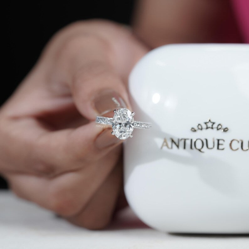 Hidden halo oval engagement ring sparkle view