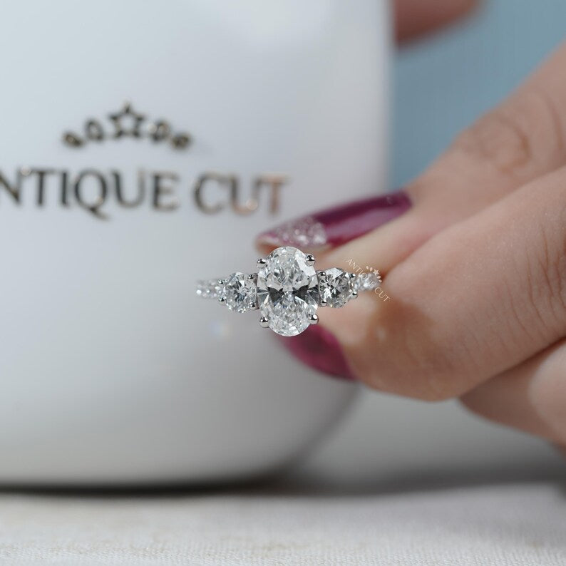 Oval diamond ring with shimmering pave diamond band