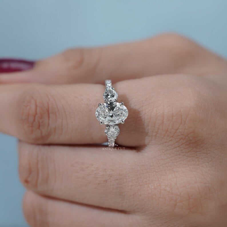 Luxury oval cut diamond ring with fine pave detailing