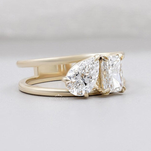 Two stone diamond ring with yellow gold setting