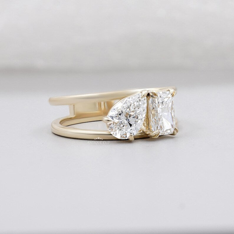 Two stone diamond ring with yellow gold setting