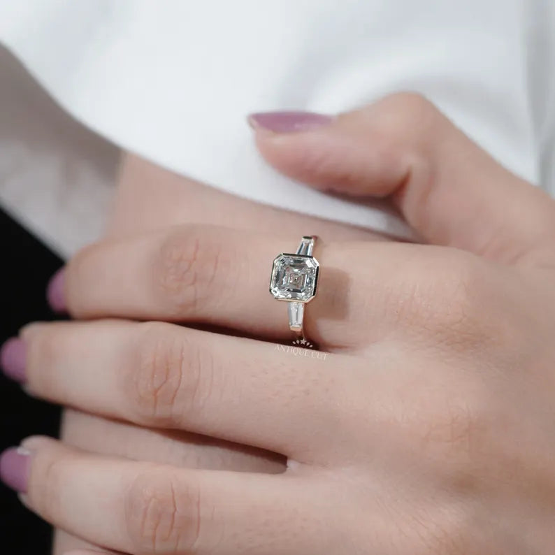 Classic three stone diamond engagement ring