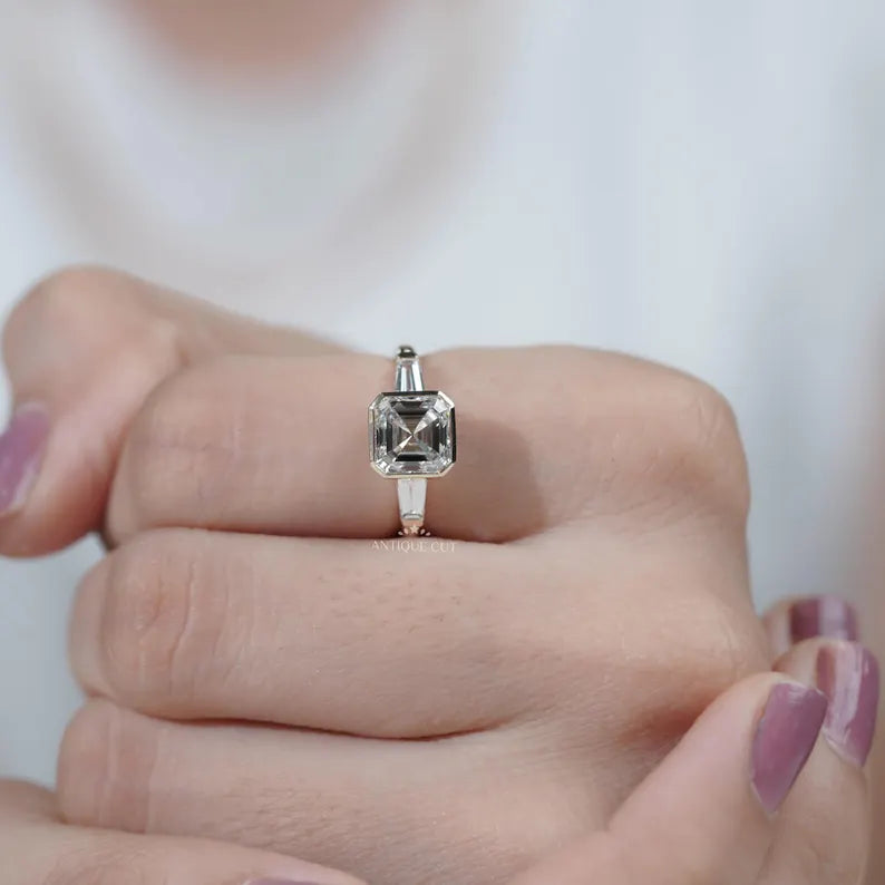 Step cut asscher diamond ring three stone style