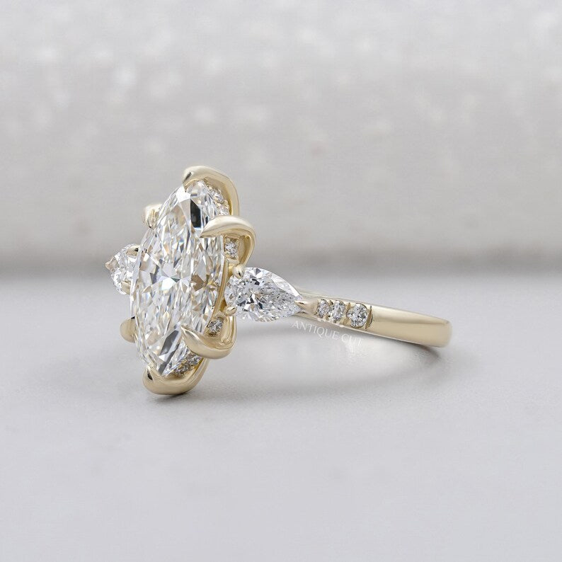 Lab grown marquise diamond ring with pear sides