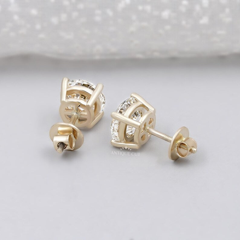 Elegant round diamond earrings solitaire style