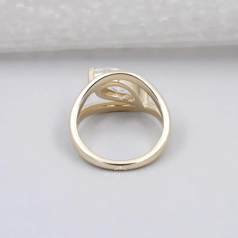 Antique inspired marquise diamond engagement ring yellow gold