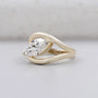 Sculptural band marquise diamond ring in yellow gold setting