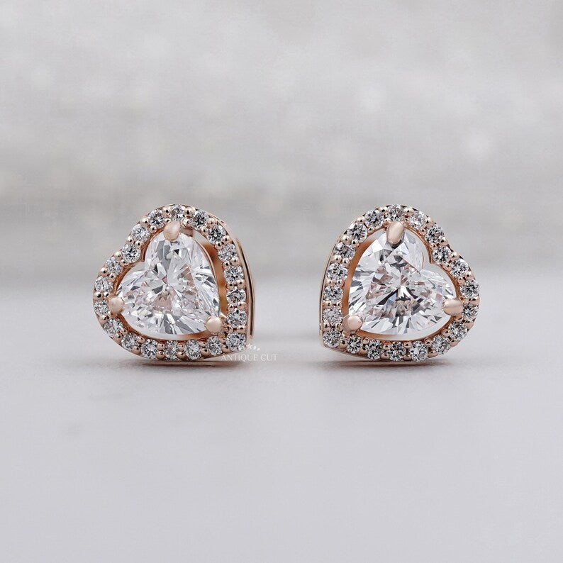 Heart cut diamond stud earrings halo setting