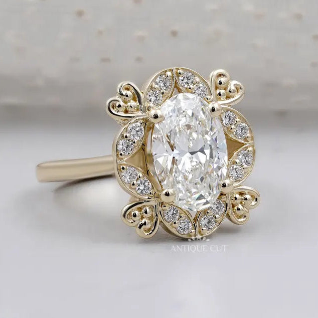 Yellow gold oval halo engagement ring close-up
