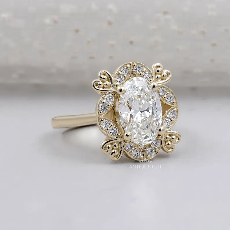 Yellow gold oval halo engagement ring close-up