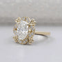 Vintage style halo ring oval diamond