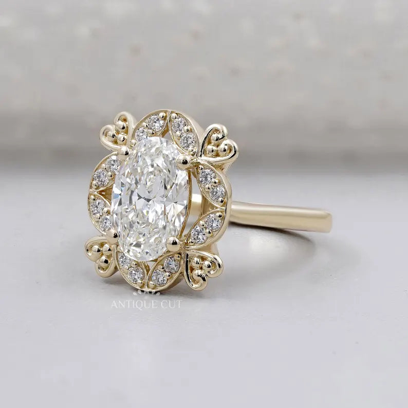 Vintage style halo ring oval diamond