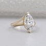 Bypass setting ring with marquise diamond