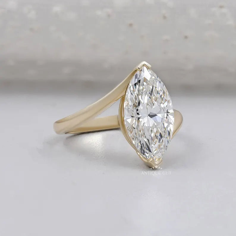 Bypass setting ring with marquise diamond