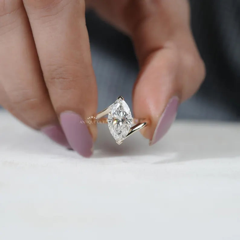 Yellow gold marquise diamond ring close-up
