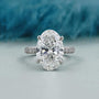Oval cut lab grown diamond ring hidden halo