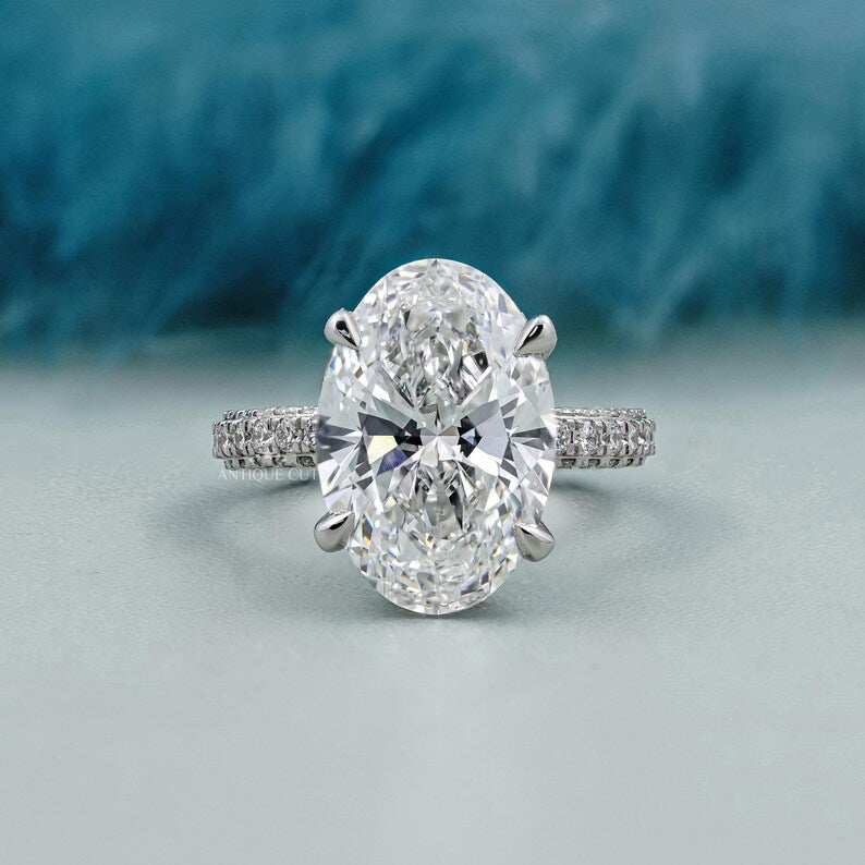 Oval cut lab grown diamond ring hidden halo