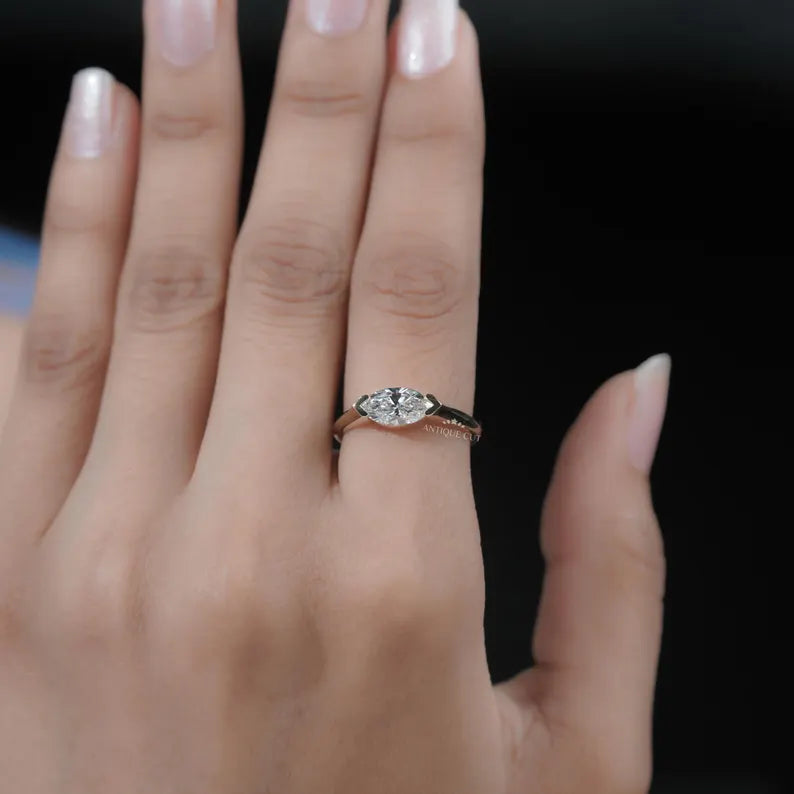 Timeless east west diamond ring marquise shape