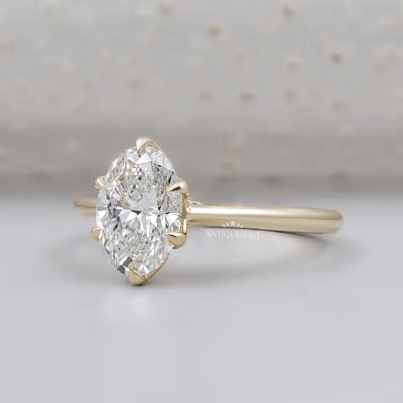 Solitaire oval diamond engagement ring close-up
