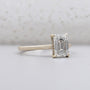 Yellow gold emerald diamond ring close-up