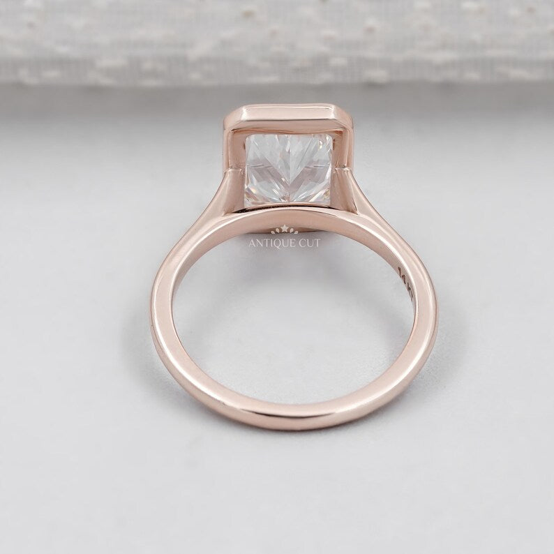 Radiant cut diamond ring with bezel setting