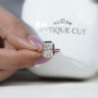 Minimalist bezel set engagement ring