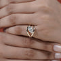 Finger elongating marquise cut diamond engagement ring