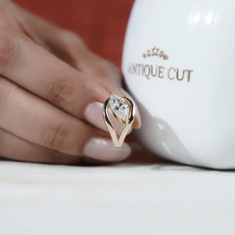 Minimalist marquise cut diamond ring in yellow gold