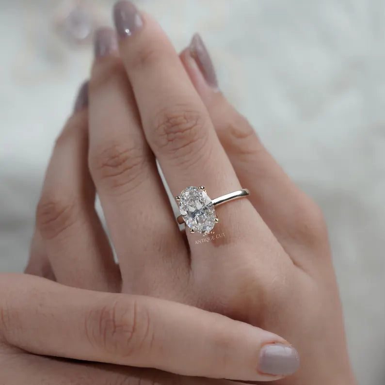 modern solitaire oval engagement ring design