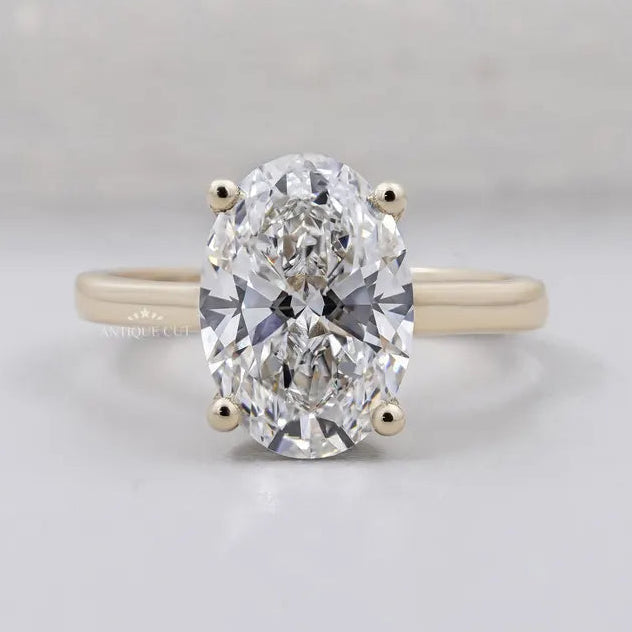 oval cut engagement ring yellow gold solitaire