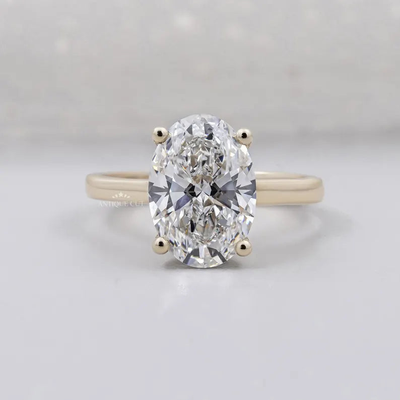 oval cut engagement ring yellow gold solitaire