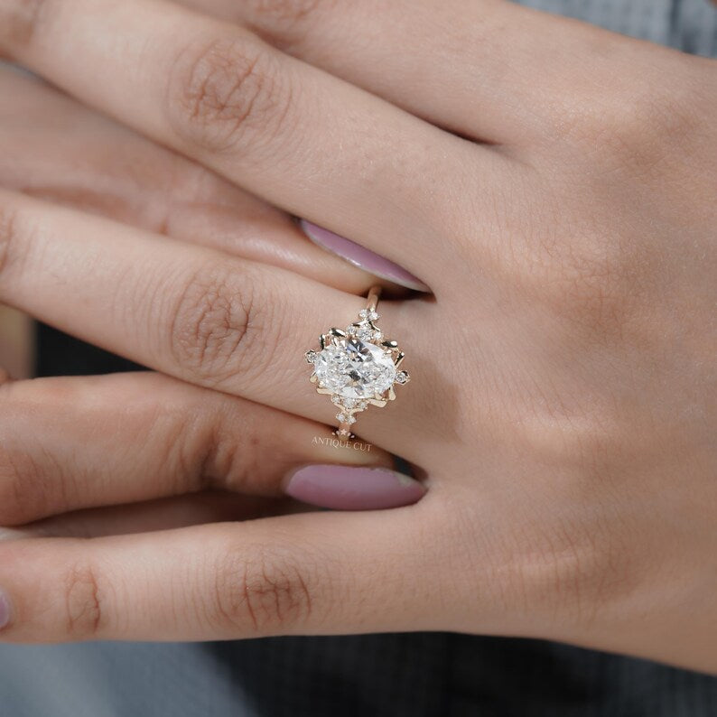 Vintage inspired oval halo engagement ring
