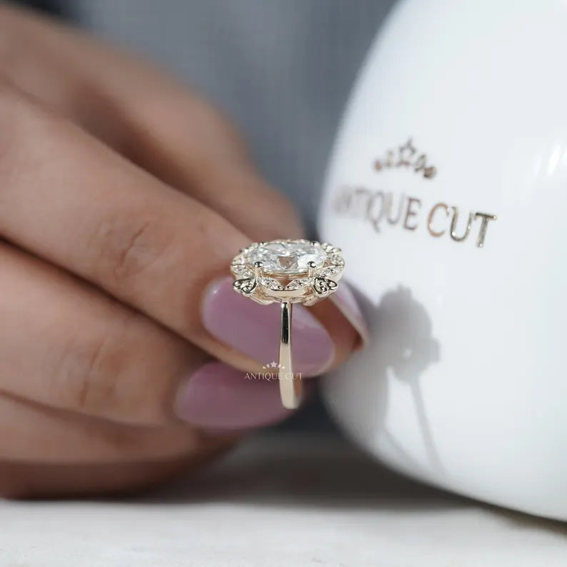 Oval diamond halo ring side view