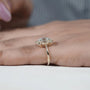 Close-up oval diamond brilliance halo
