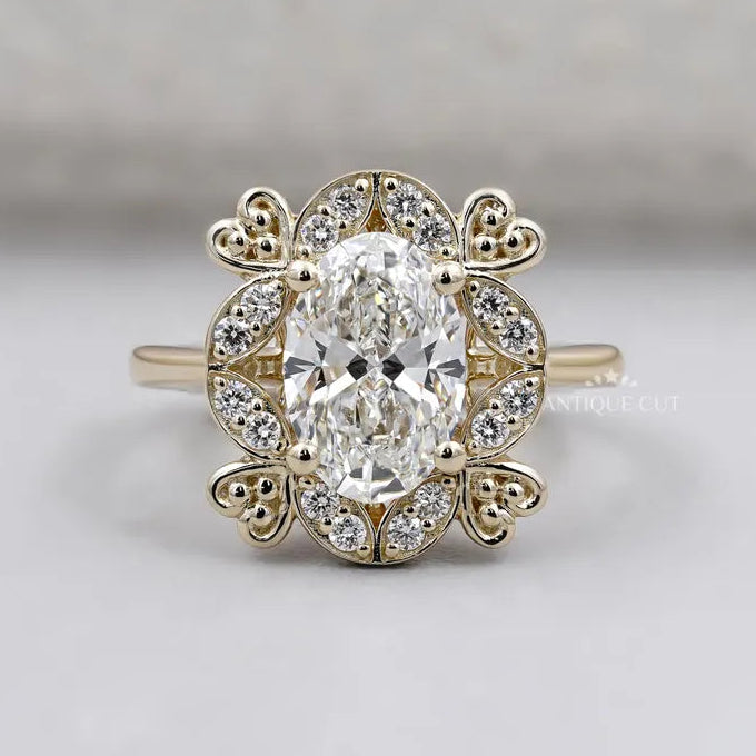 Oval cut diamond engagement ring with vintage halo