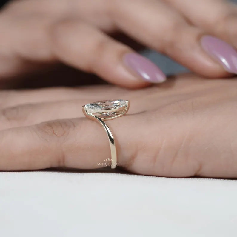 Elegant solitaire marquise ring detail