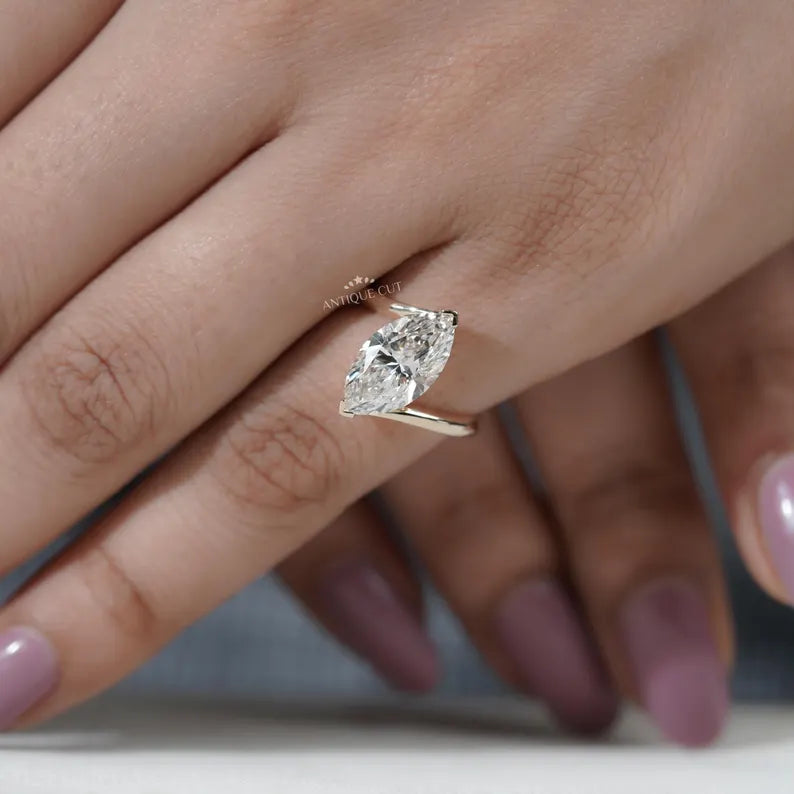 Contemporary marquise bypass ring