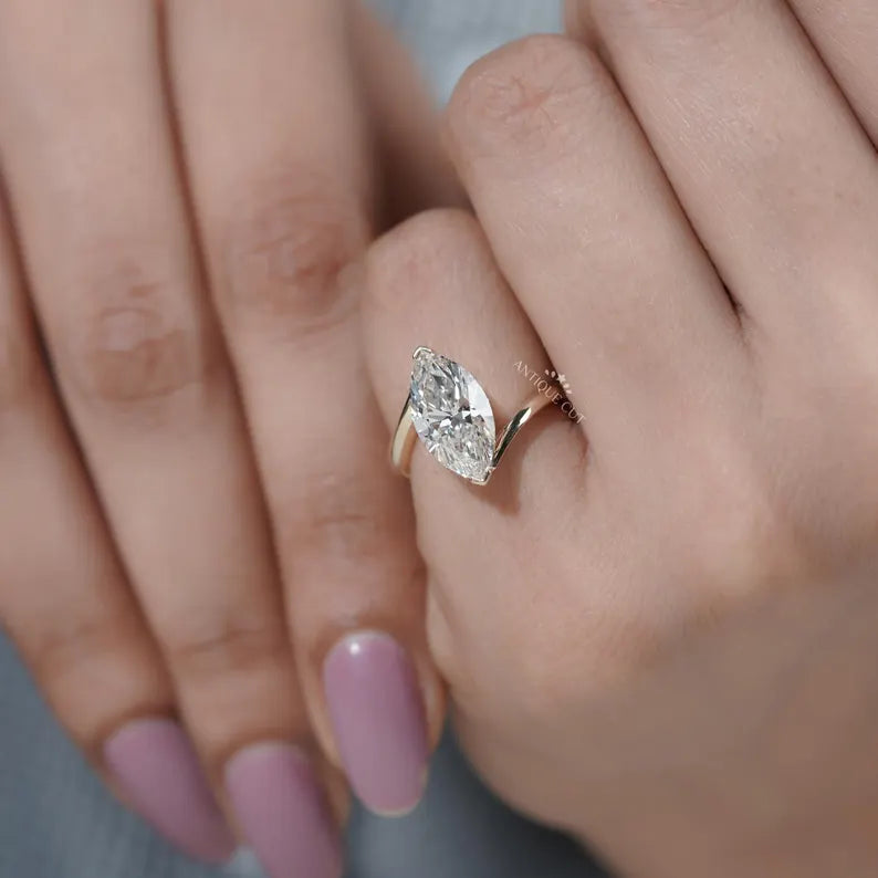 Bridal marquise cut engagement ring