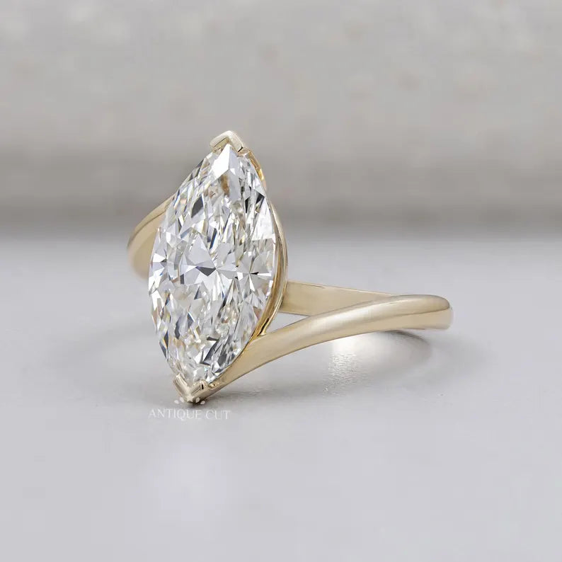 Marquise engagement ring with V-shaped prongs